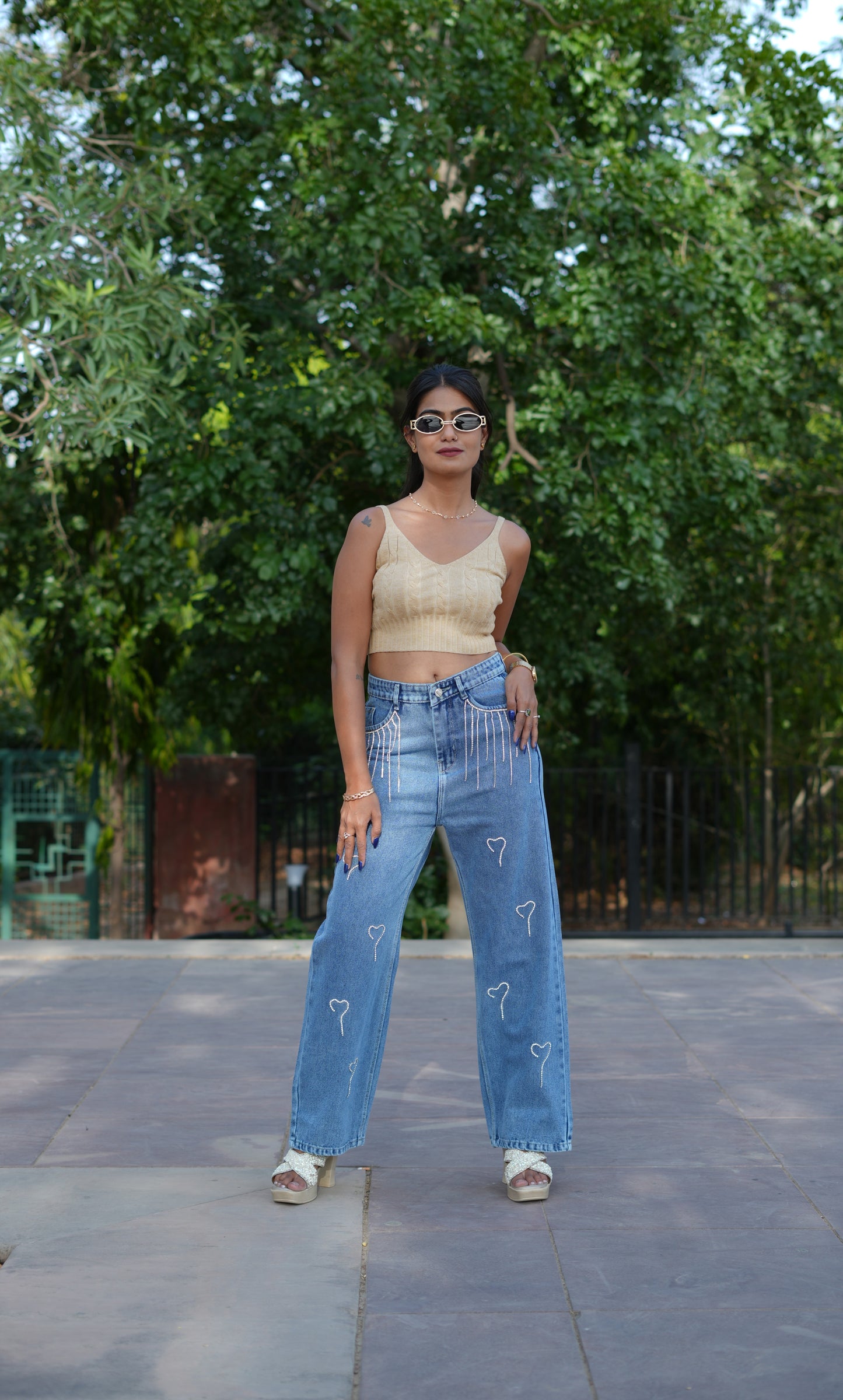 Woman Straight Fit Highly Distressed Embellished Jeans